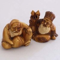 Lot 96 - Two netsukes of bearded men.