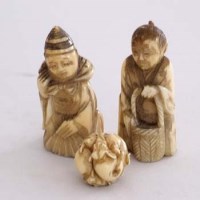 Lot 98 - Ball of elephants and two carved figures.