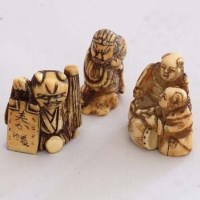 Lot 99 - Three ivory netsukes.