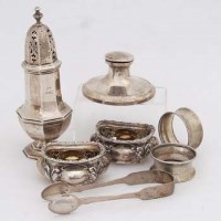 Lot 206 - Silver caster; pair salts; capstan inkwell; 2 napkin rings; pair sugar tongs.