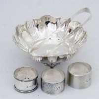 Lot 214 - Silver bon bon dish; pair Bateman tongs; 3 napkin rings.
