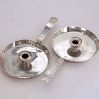 Lot 220 - Pair of Victorian silver chamber candlestick in