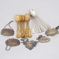 Lot 228 - Six Victorian silver teaspoons, six continental gilt ice cream spoons, five wine labels