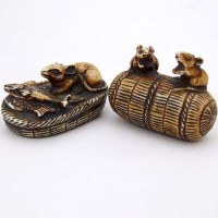 Lot 83 - Rat on bail of rice and rat with fish (2).