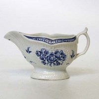 Lot 120 - Worcester sauceboat circa 1770 with strap fluting