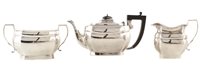 Lot 32 - A three piece silver tea set, Birmingham, 1933.