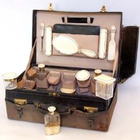 Lot 220 - Silver gilt travelling set.