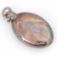 Lot 233 - Silver hip flask in the form of rugby ball