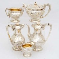 Lot 244 - Elkingtons silver five piece set.