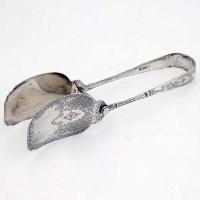 Lot 250 - Silver asparagus servers.