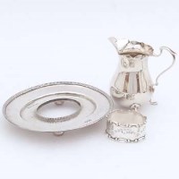 Lot 260 - Cream jug, napkin ring, inkwell stand