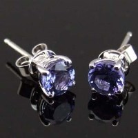 Lot 353 - Pair of tanzanite ear studs set in 18ct white