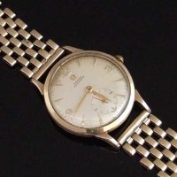 Lot 362 - Man's Gold Omega wristwatch on Gold Bracelet with extra link.