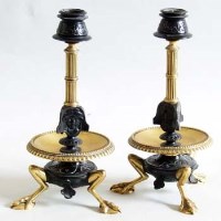 Lot 394 - Pair of classical candlesticks.