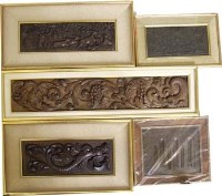 Lot 398 - Five carved oak panels (framed).