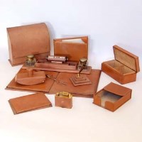 Lot 405 - Leather desk set.