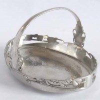Lot 410 - Archibald Knox tudric basket dish.