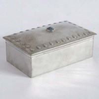 Lot 411 - Pewter tudric box set with a turquoise stone.