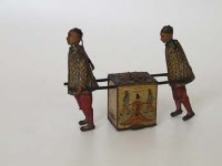 Lot 527 - Lehmann Oriental figures tin plate toy.