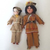 Lot 531 - Two am dolls with oriental and red indian