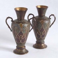 Lot 553 - Pair of enamelled 19th century metal vases.