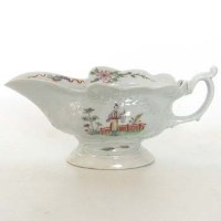 Lot 574 - Worcester sauceboat circa 1755   moulded silver