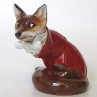 Lot 671 - Royal Doulton fox in hunting attire