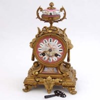Lot 682 - French gilt metal and porcelain mantel clock.