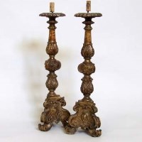 Lot 707 - Pair of Italianate carved and gessoed pricket candlesticks