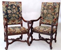 Lot 760 - Pair of oak 17th century style open arm chairs