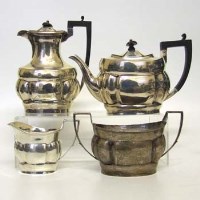 Lot 219 - Silver four piece tea set.