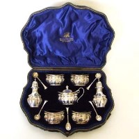 Lot 233 - Cased silver condiment set