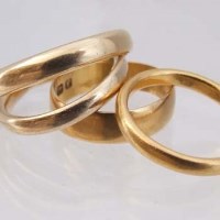 Lot 257 - Two 22ct gold bands; an 18ct band; a 9ct band (4)