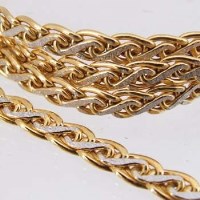 Lot 263 - 9ct gold yellow and white guilloche necklace