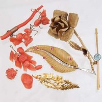 Lot 314 - Nine carat gold rose spray brooch;eighteen carat white & yellow gold leaf brooch set rubies & diamonds ; fifteen carat gold aquamarine bar brooch; red