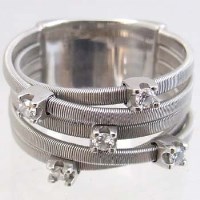 Lot 324 - 18ct white gold five-stone diamond ring.
