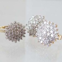 Lot 353 - Pair of diamond cluster studs, approximately 2ct