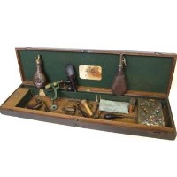 Lot 419 - Oak shotgun box by stevens including reloading