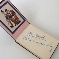 Lot 421 - Autograph album with signatures and cartoon of Laurel & Hardy. 8cm x 5 cm (1 vol)