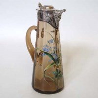 Lot 447 - Glass and silver plated claret jug