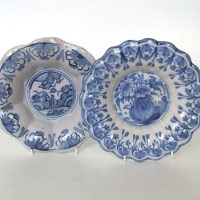 Lot 480 - Two Delft lobed dishes   painted with flora and