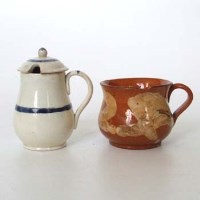 Lot 521 - Slipware jug and a pearlware mustard pot