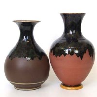 Lot 581 - Two Minton Terracotta vases with experimental vases DB389, and 393