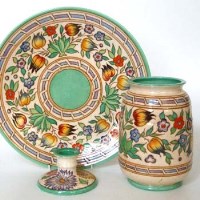 Lot 596 - Charlotte Rhead candlestick vase and charger