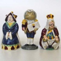 Lot 617 - Beswick Alice in wonderland three figures