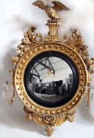 Lot 648 - Convex gilt wood wall mirror