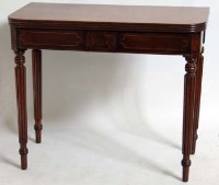 Lot 665 - Mahogany fold-over card table.