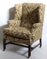 Lot 667 - Chippendale style wing back chair