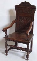 Lot 668 - 17th century style oak elbow chair