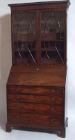 Lot 695 - George III mahogany bureau bookcase
